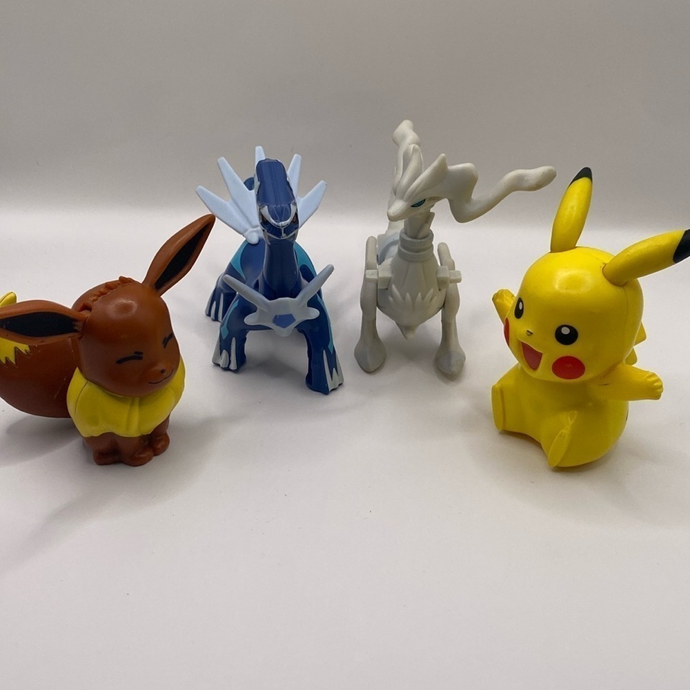 McDonald’s Pokémon Collectible Bundle Seven Figurines Dialga Eevee Reshiram